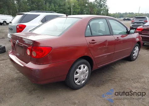 2005 Toyota Corolla Le z USA, uszkodzony, nr VIN 2T1BR32E35C390615